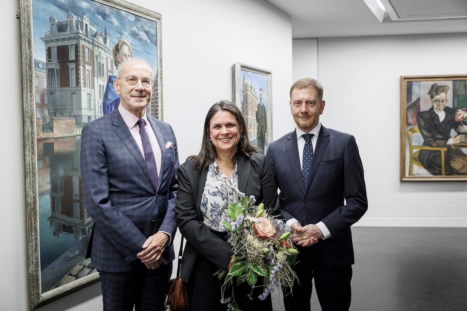 Christine Regus mit Frank Druffner (stellvertretende Generalsekretär, links) und Sachsens Ministerpräsident Michael Kretschmer